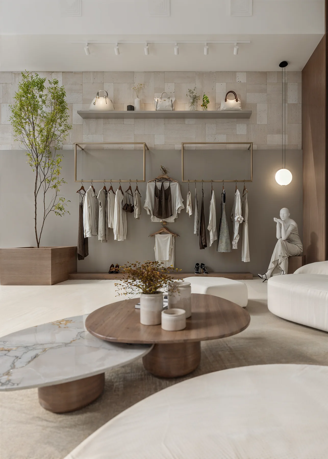 Closet-boutique com travertino, araras suspensas e nichos de latão